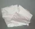 Picture of new white t-shirt wiping rags. They are cut-up pieces of T-shirt cloth wiping materials in white.